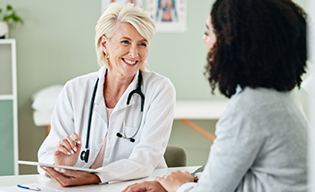 Doctor discussing information with a patient during a consultation